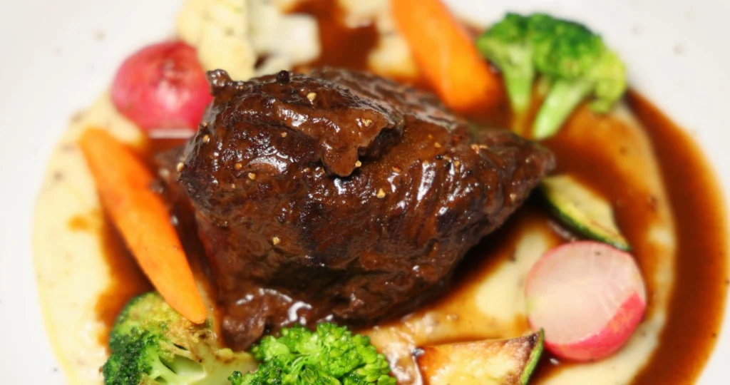 Hearty short rib stew with tender beef and vegetables in a rich homemade sauce